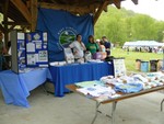 River Coalition Booth and Recycle Barrels on Grounds