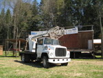 Preston Machine donates their time and equipment to put up and take down our banners